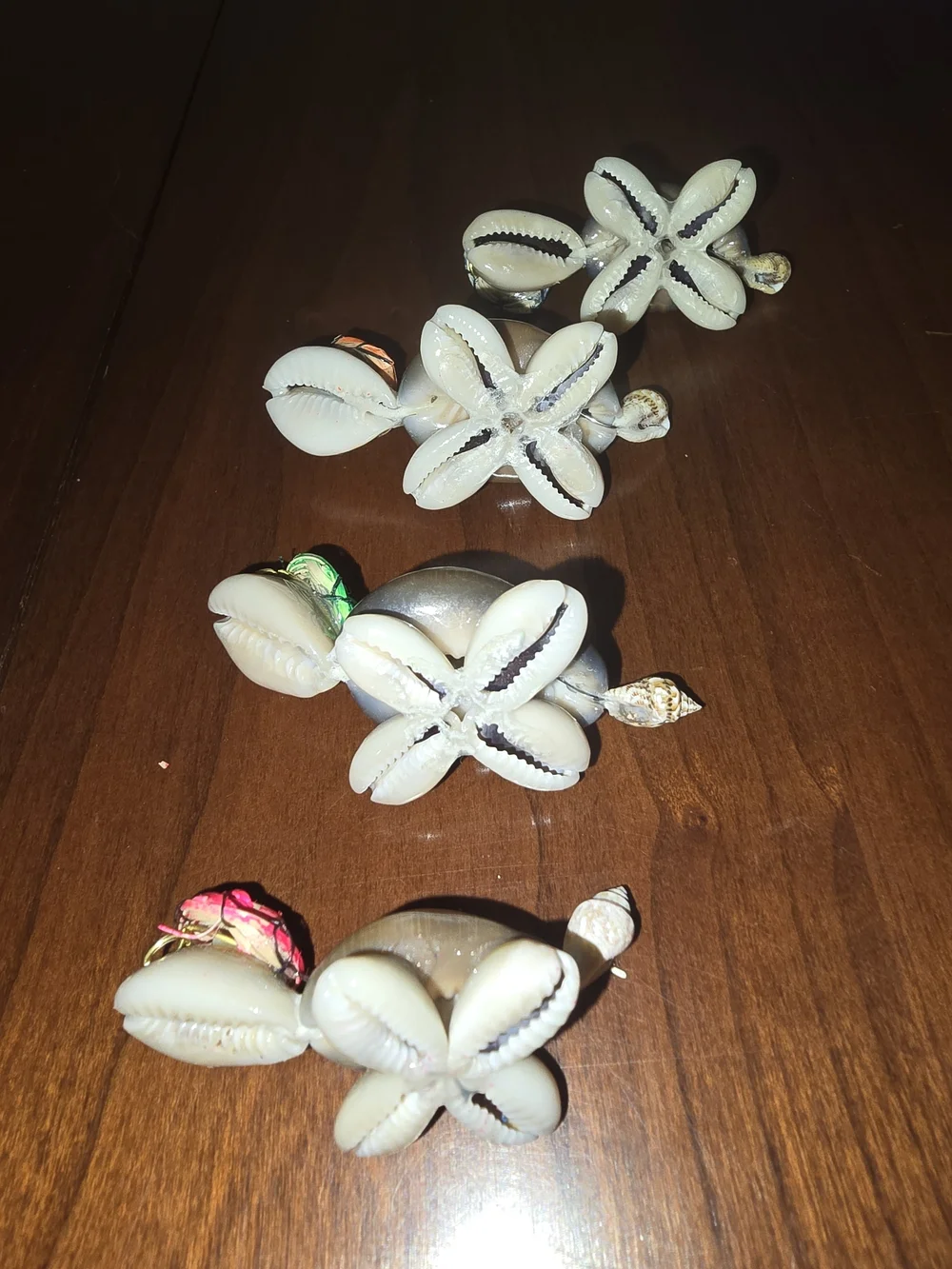 Four Cute Handmade Mini Turtles Made From Seashells with Glasses and Straw Hats